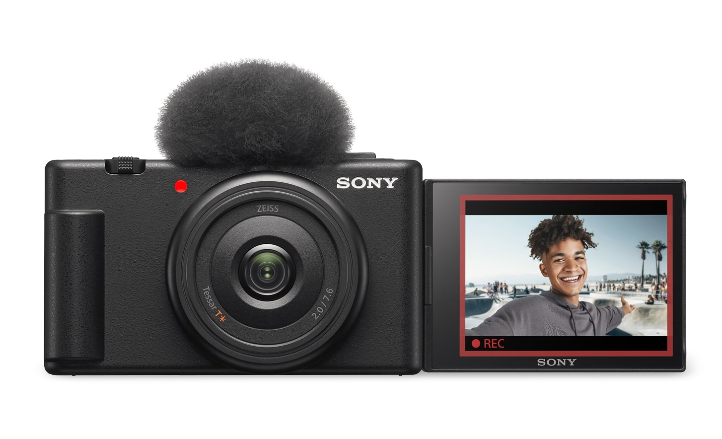 Snímek modelu ZV-1F s nasazenou ochranou proti větru a vyklopeným displejem